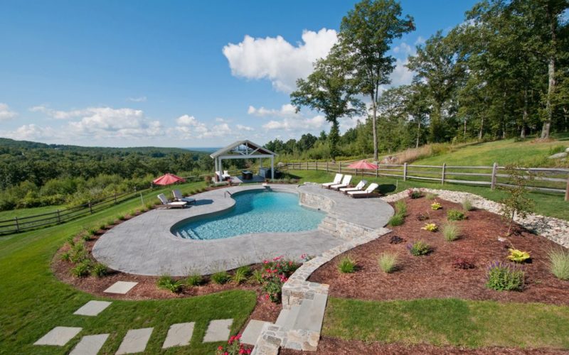 Custom pool installed by Majestic Pools in a country side landscape